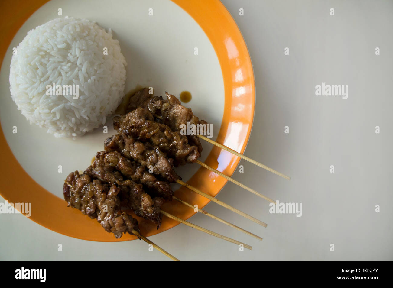 Grilled barbecued pork with white Jasmine rice Stock Photo