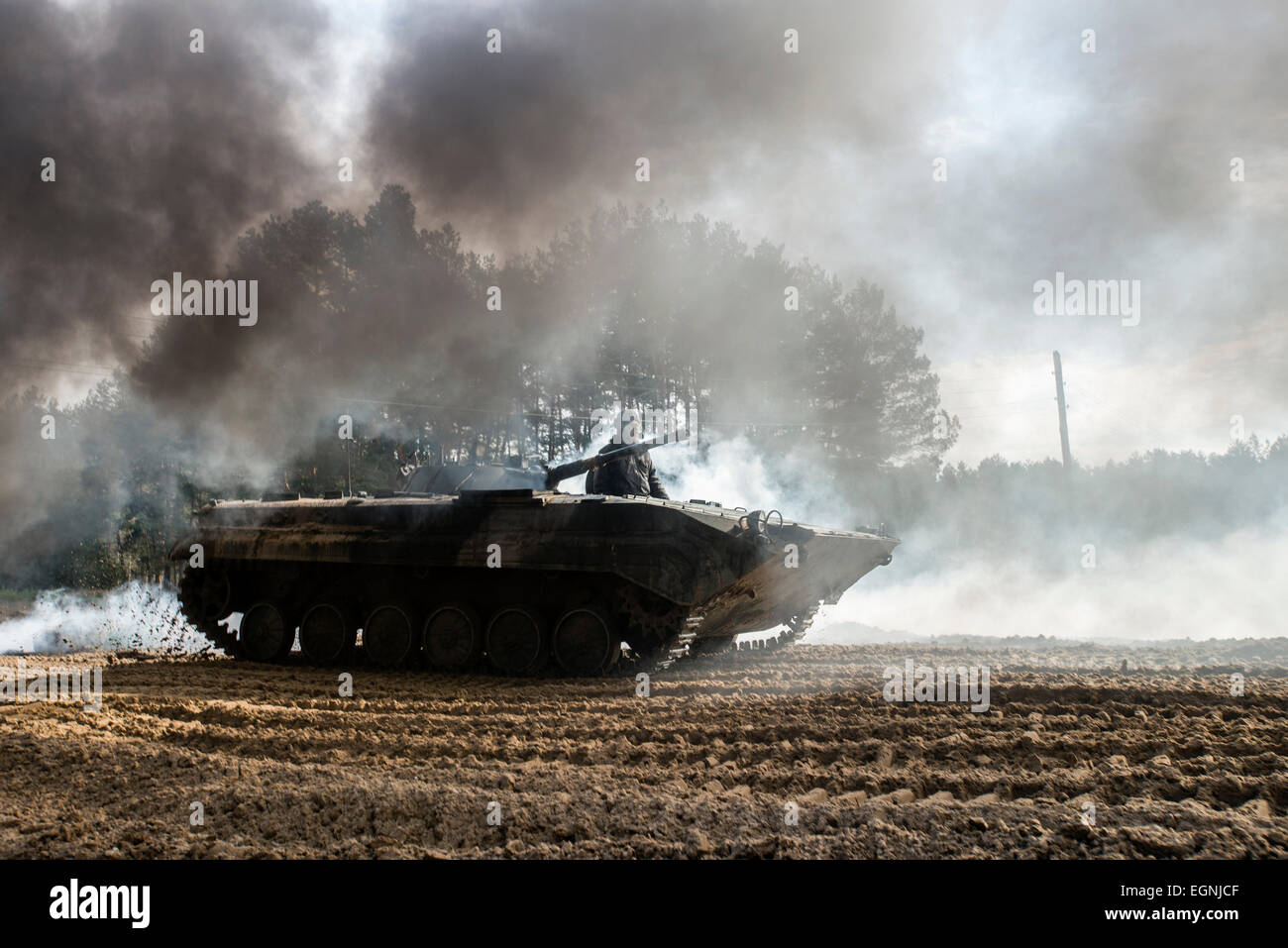 Cadets drive the BMP-1 infantry fighting vehicle during full-scale ...