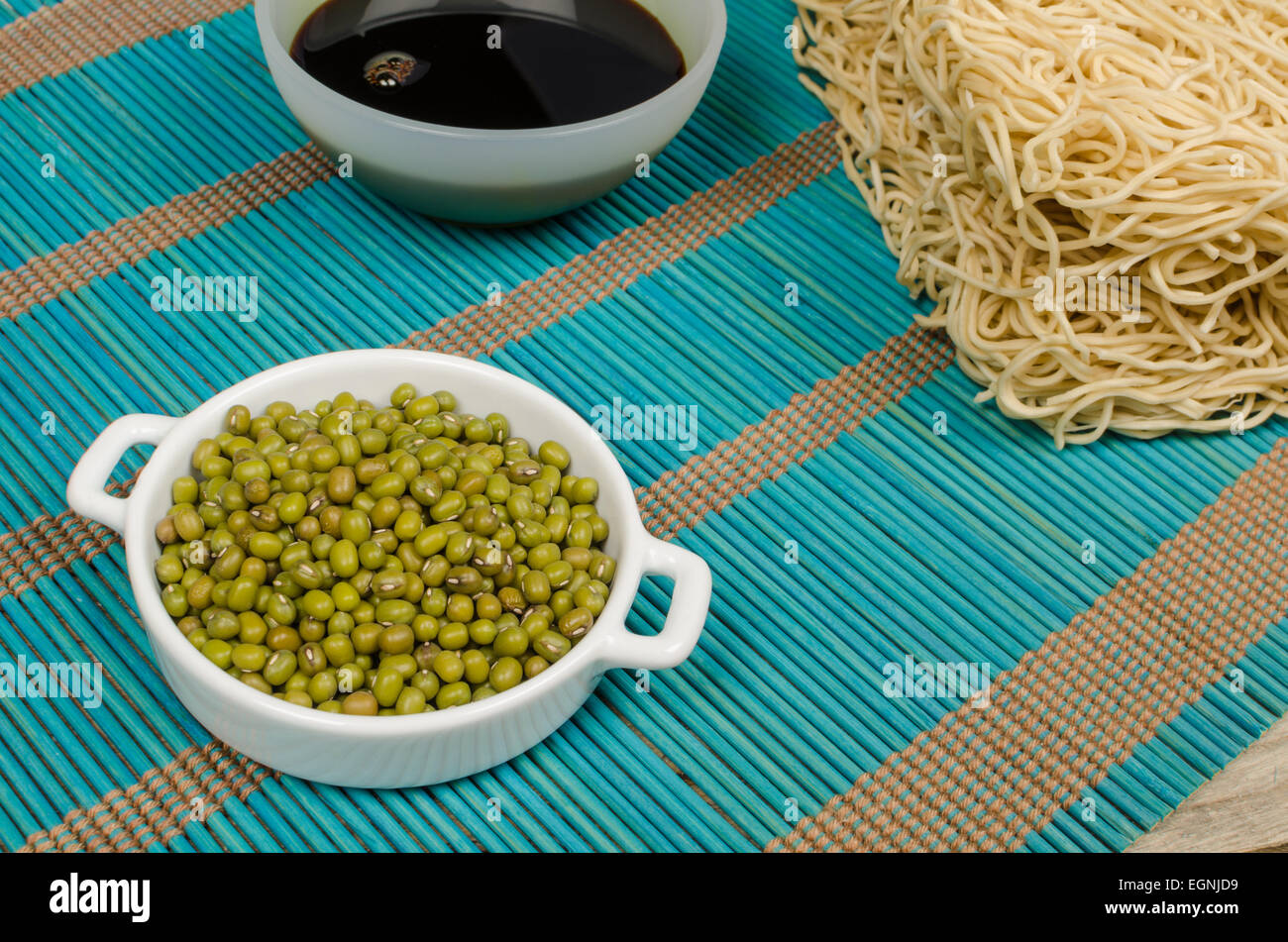 Chow mein noodles, soy sauce and soy beans, Asian food ingredients