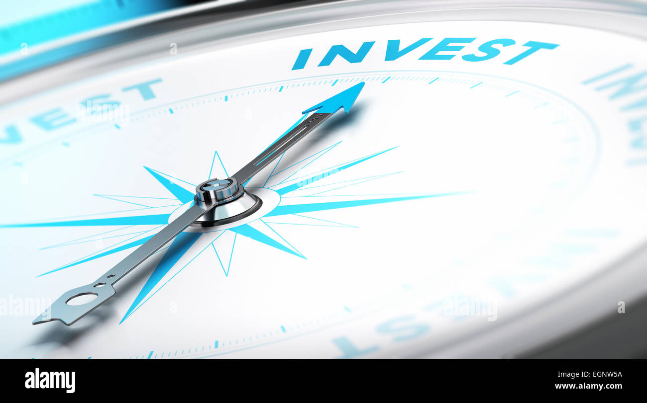 Conceptual Compass with needle pointing to the word invest. Business background image. Financial concept. Stock Photo