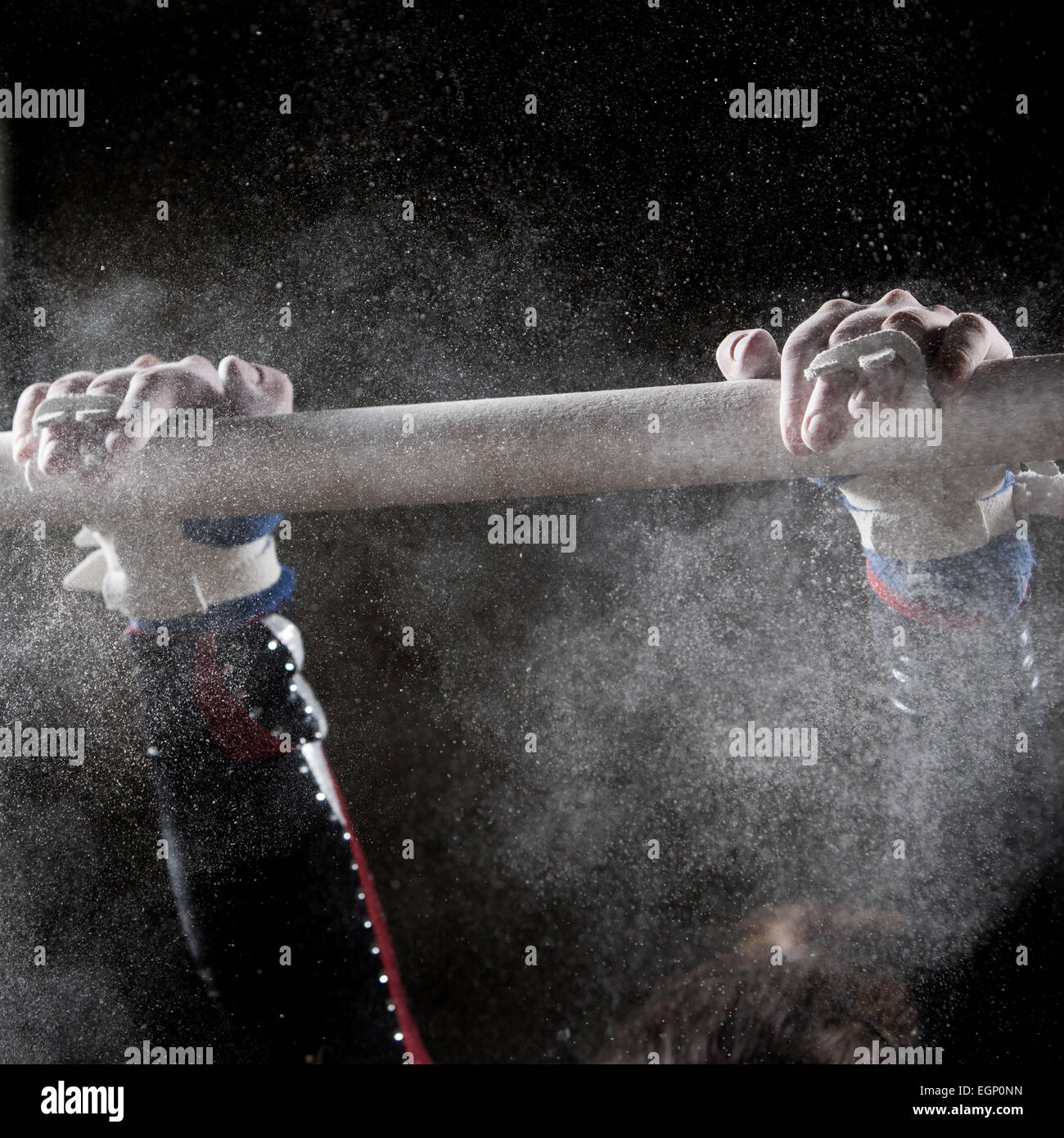 hands of gymnast on uneven bars with chalk Stock Photo Alamy