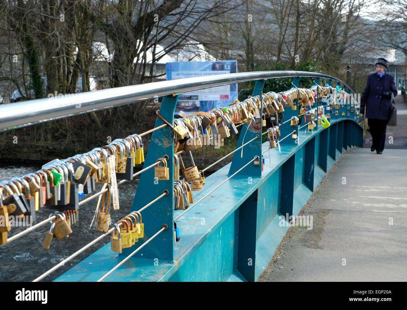 Love locks attached to the cable bridge, Bakewell, Derbyshire, England