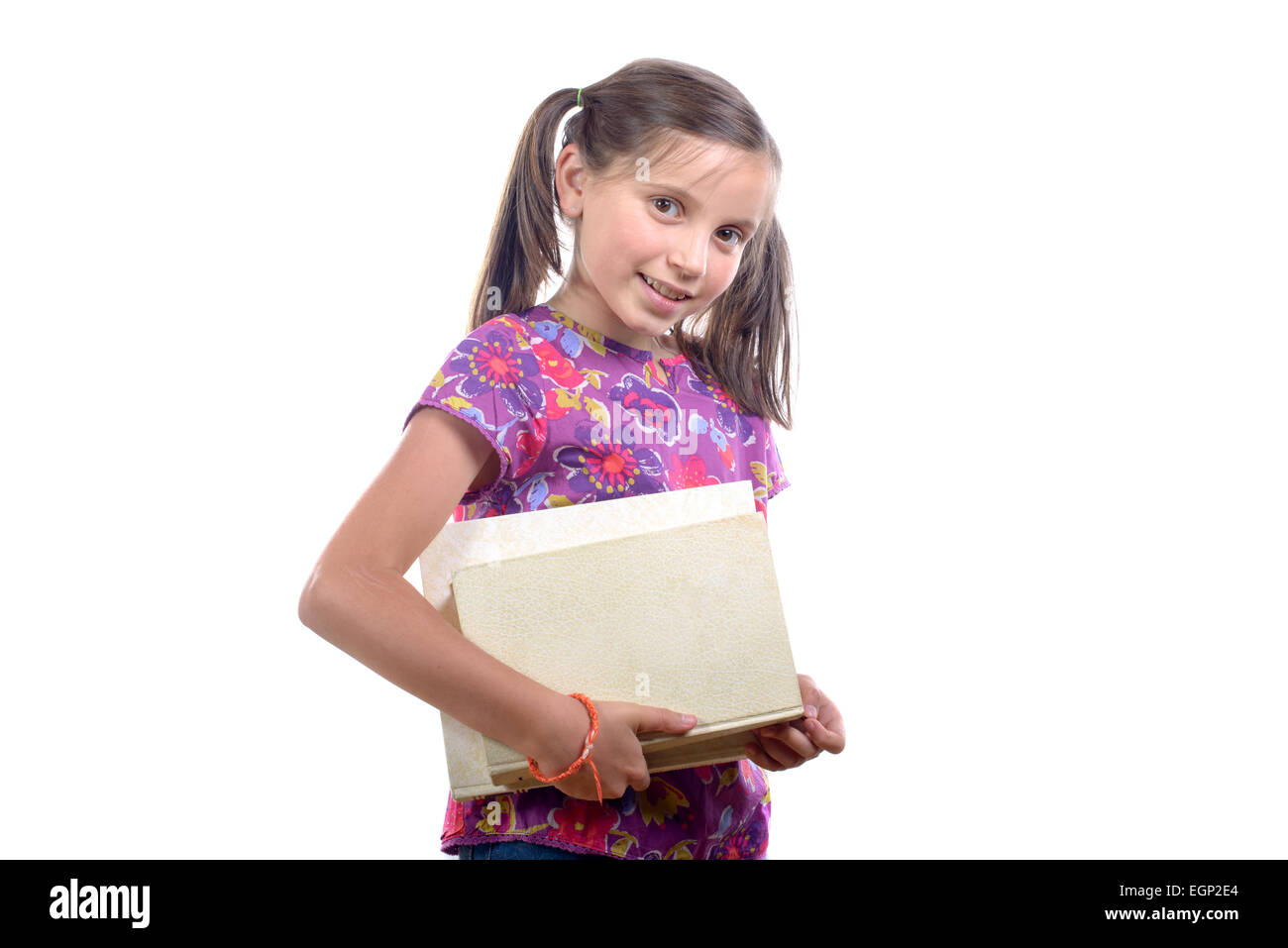 Schoolgirl with pile of books on white background Stock Photo - Alamy