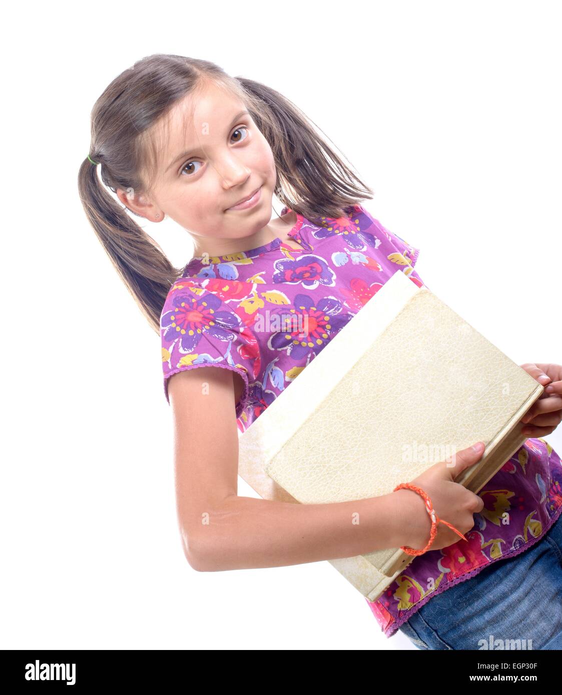 Schoolgirl with pile of books on white background Stock Photo - Alamy
