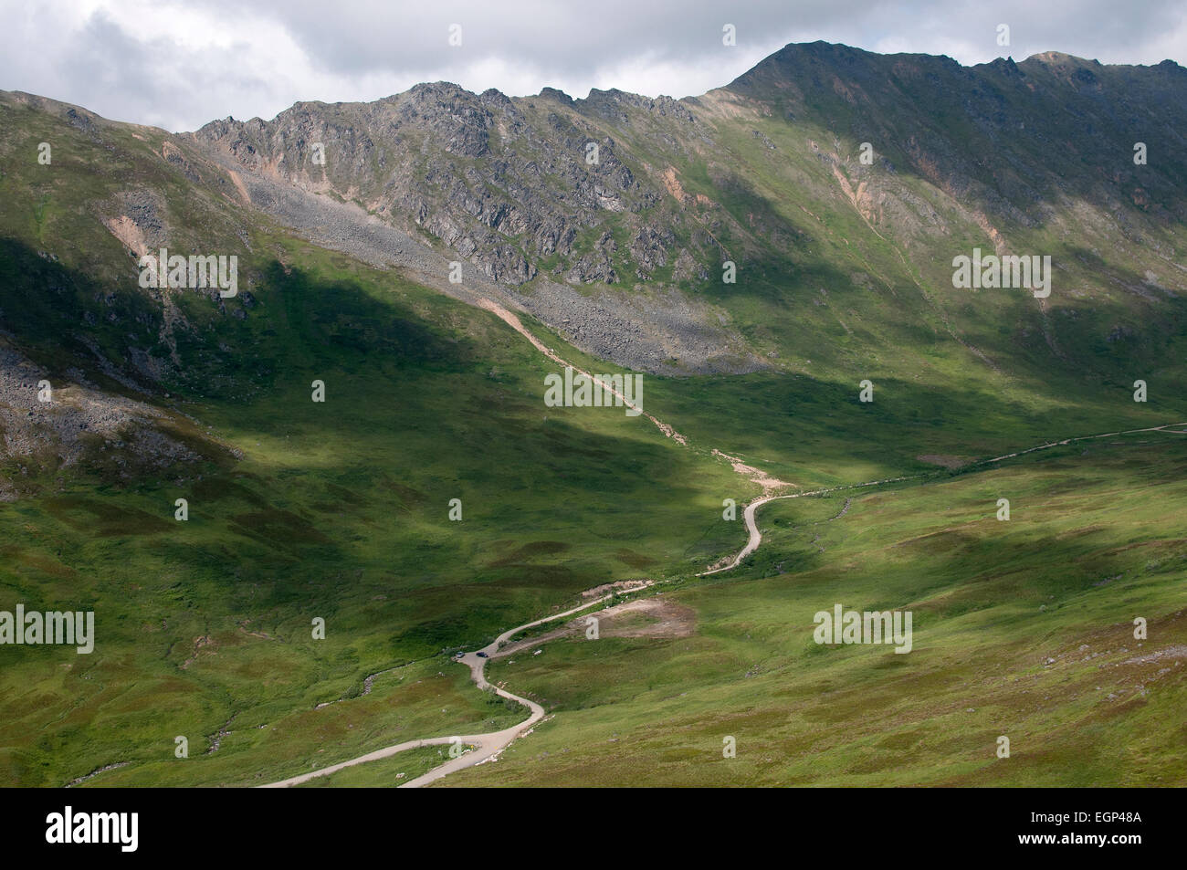 Hatcher Pass road in Alaska forming a ribbon in the distance Stock Photo Alamy