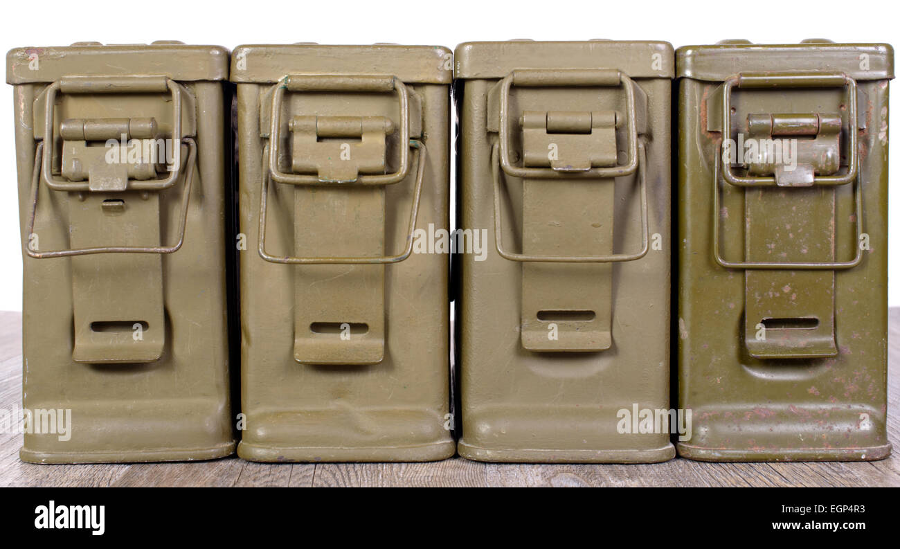 four ammunition boxes on wooden table Stock Photo Alamy