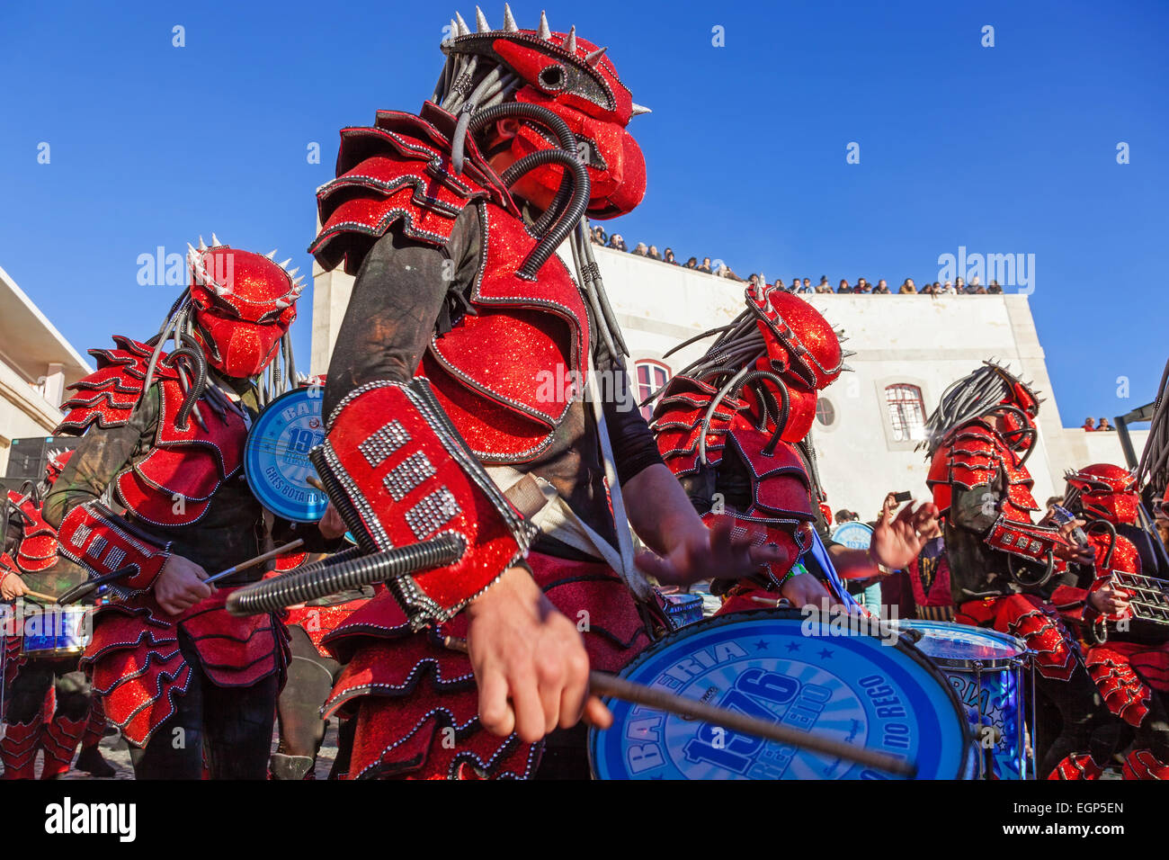 Bateria, the musical section of the Samba School, playing for dancers in the Rio de Janeiro style Carnaval parade. Stock Photo