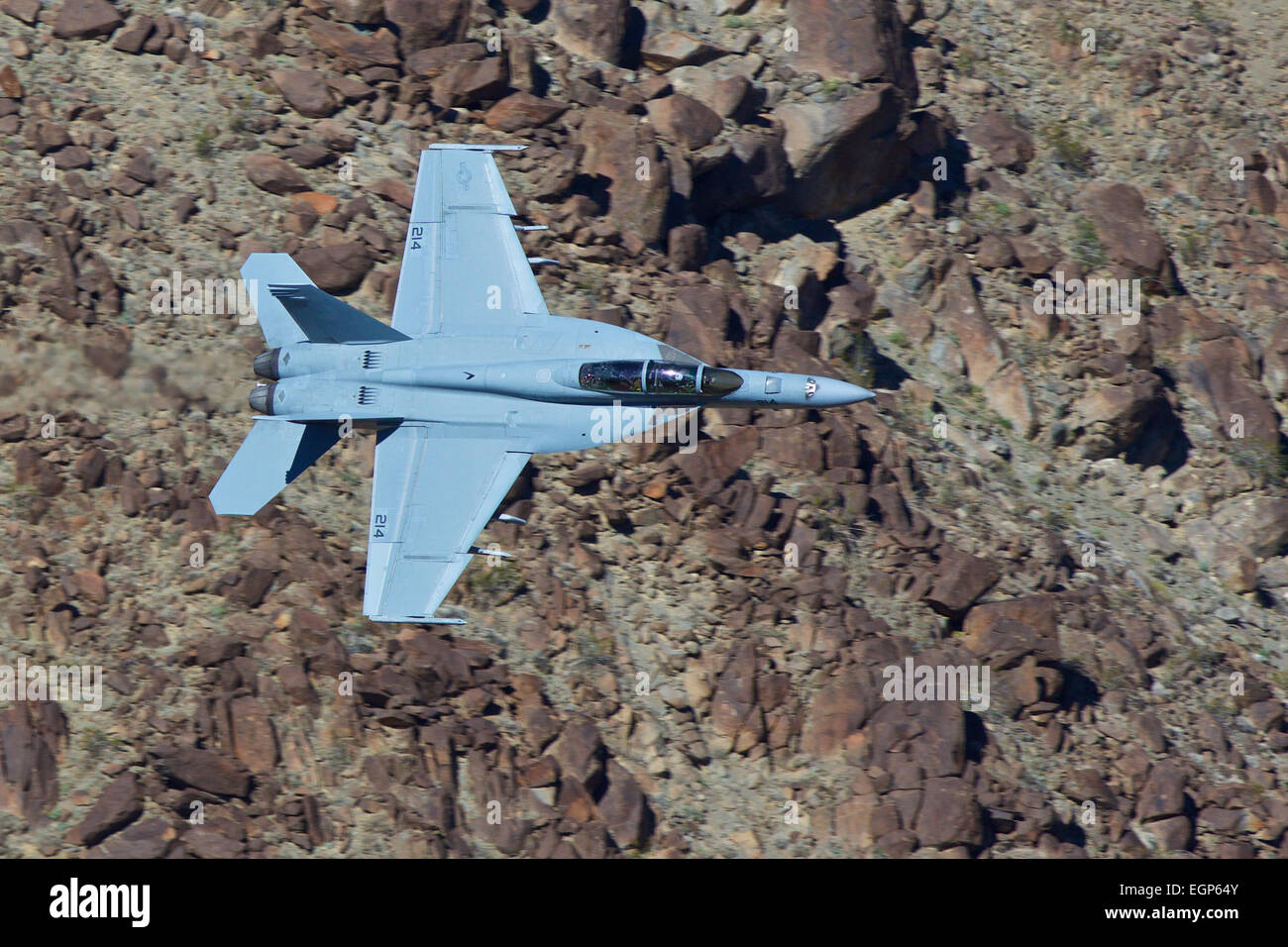 Close Up Topside View Of A US Navy F/A-18F Super Hornet Jet Fighter, VX-9 Squadron, China Lake, Flying At Low Level. Stock Photo
