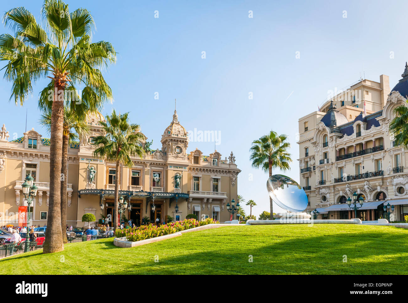 MONTE CARLO, MONACO - OCTOBER 3, 2014: Monte Carlo Casino and Hotel de Paris in Monaco with Sky Mirror sculpture by Anish Kapoor Stock Photo