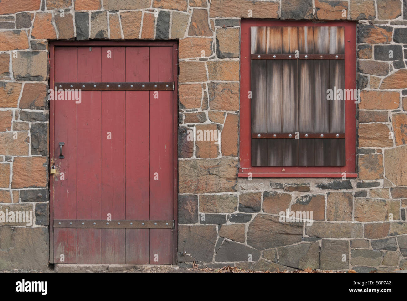Abandoned Stone Building with red door Stock Photo - Alamy