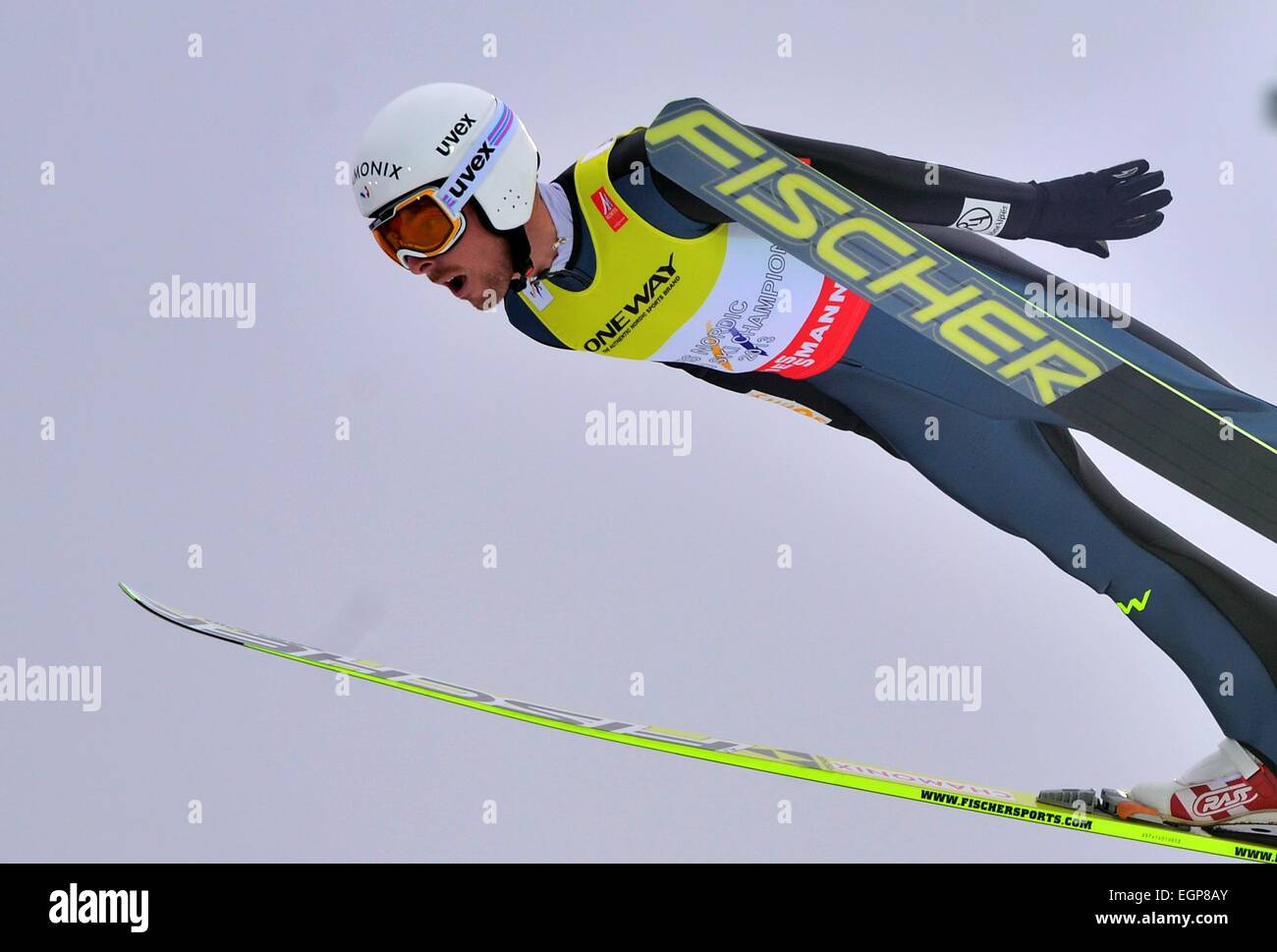 Falun, Sweden. 28th Feb, 2015. Francois Braud of France soars through the air during the ski
