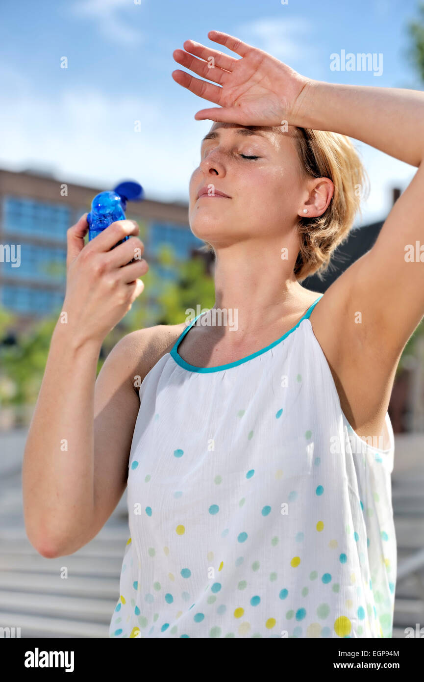 Woman sweating in the summer Stock Photo Alamy