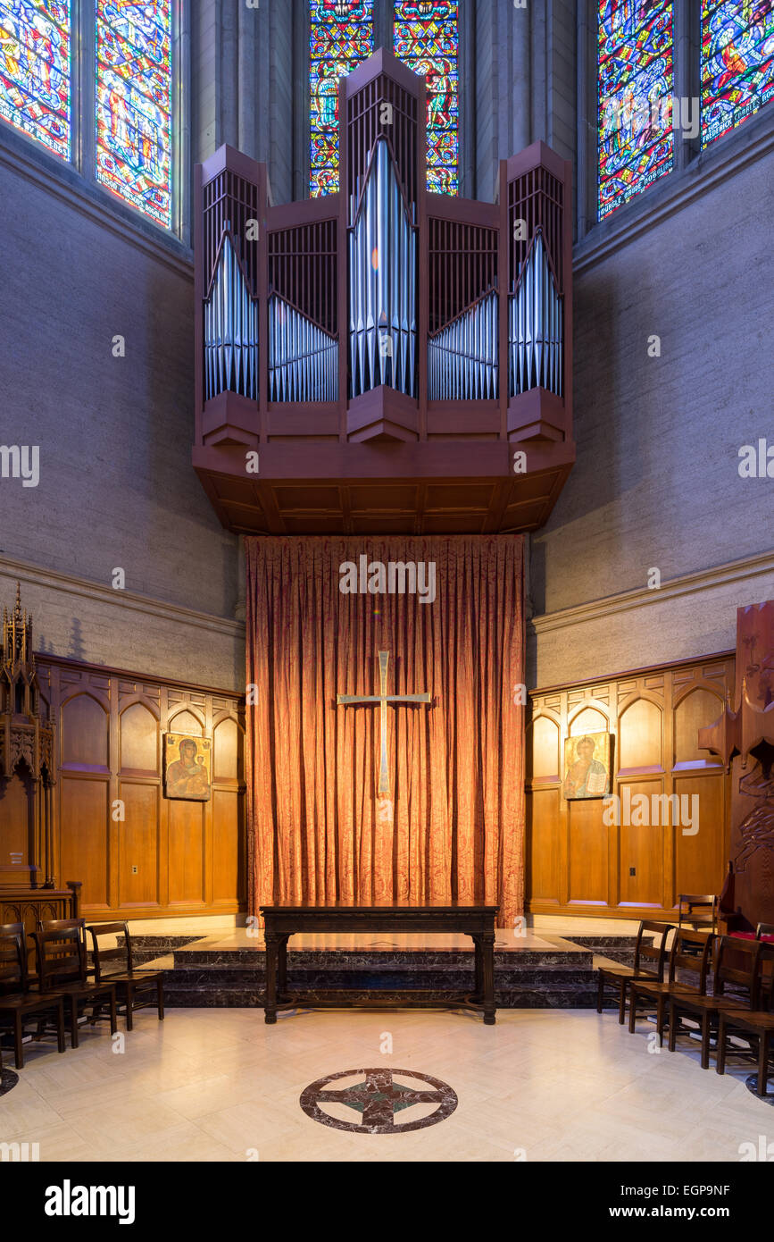 Pipe organ detail and stained glass windows in Grace Cathedral