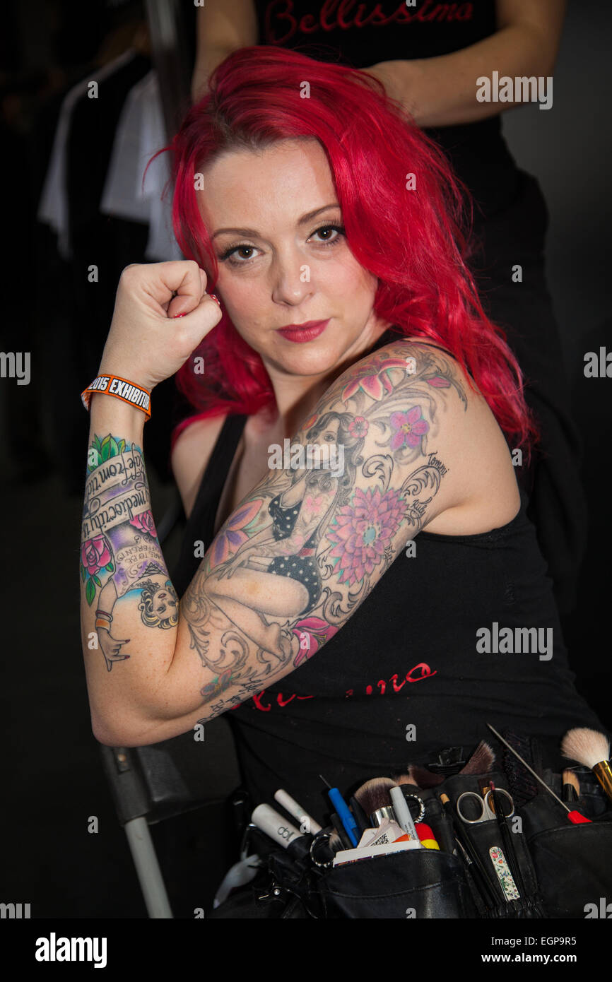 Female body tattoos in Manchester, UK 28th February, 2015. Jane Bellis, Bellissimo Creative Specialists at the 14th Manchester International Tattoo Show. Thousands of tattoo lovers flocked to Manchester this weekend to get Female body tattoos in Manchester, UK 28th February, 2015. Jane Bellis, Bellissimo Creative Specialists at the 14th Manchester International Tattoo Show. Thousands of tattoo lovers flocked to Manchester this weekend to get