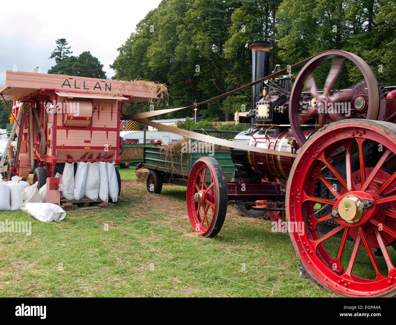 Vintage threshing machine driven by a traction engine Stock Photo Alamy