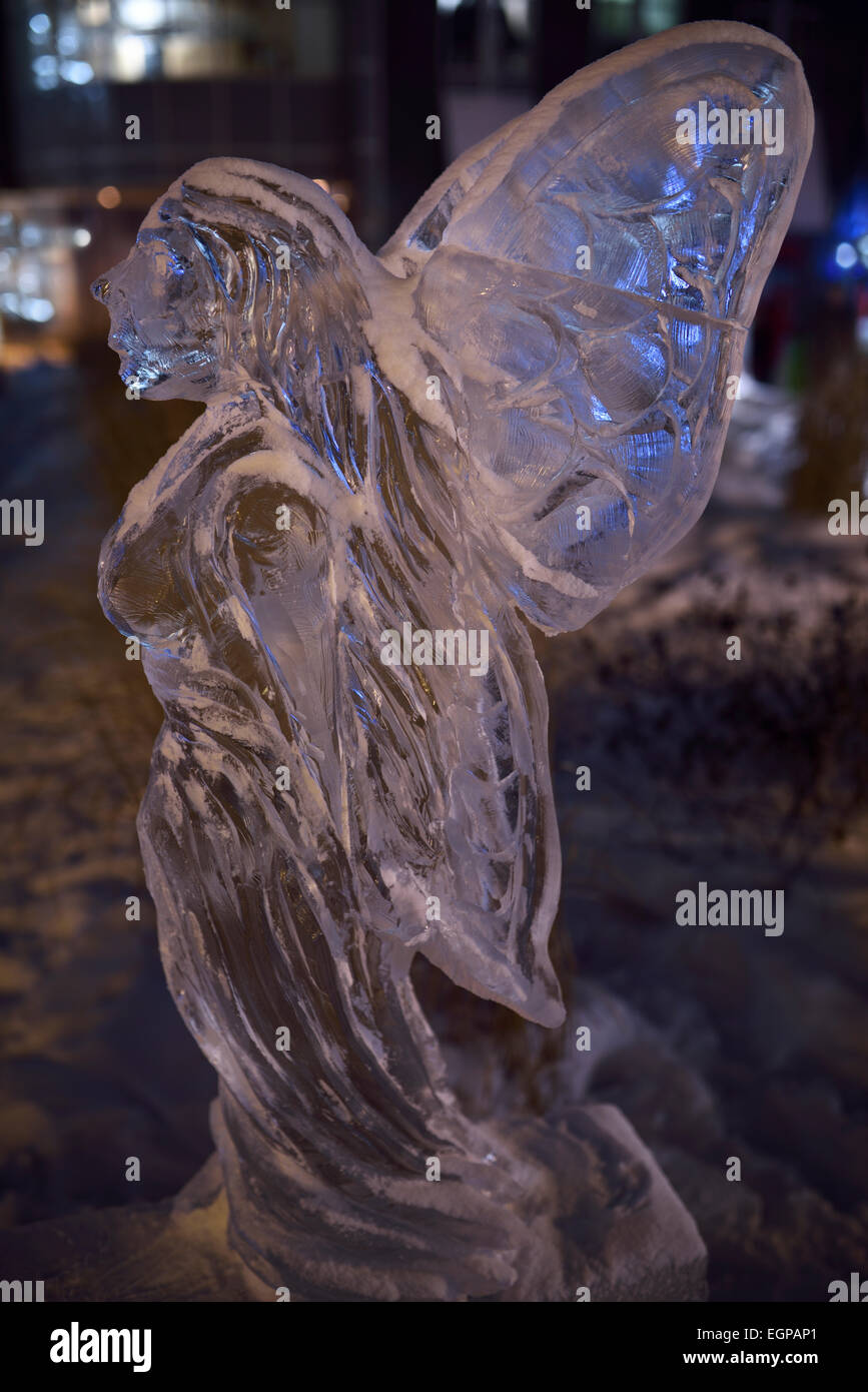 Female ice sculpture with wings at Bloor Yorkville Village Park Annual Icefest Toronto Stock Photo