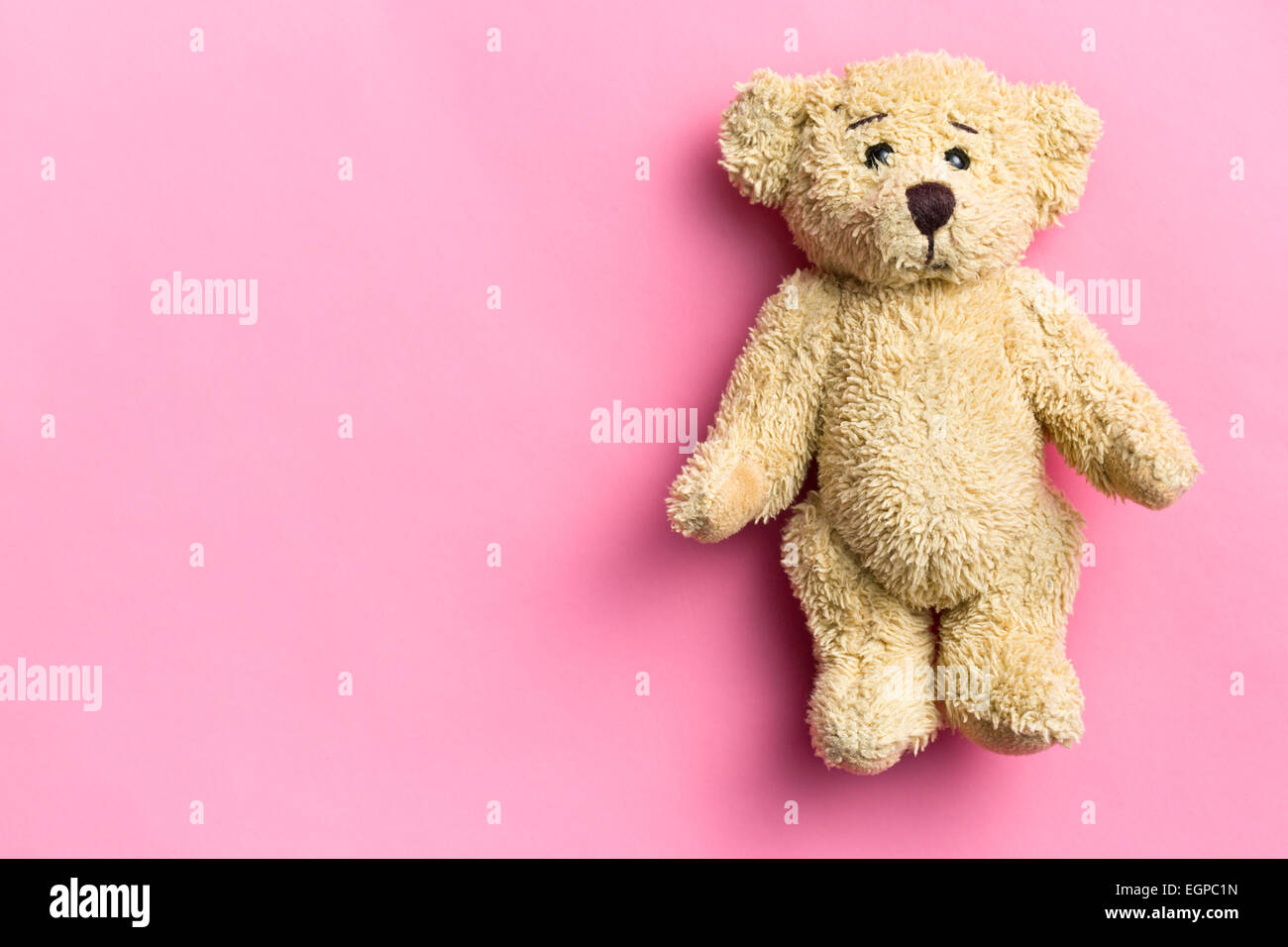 the teddy bear on pink background Stock Photo - Alamy