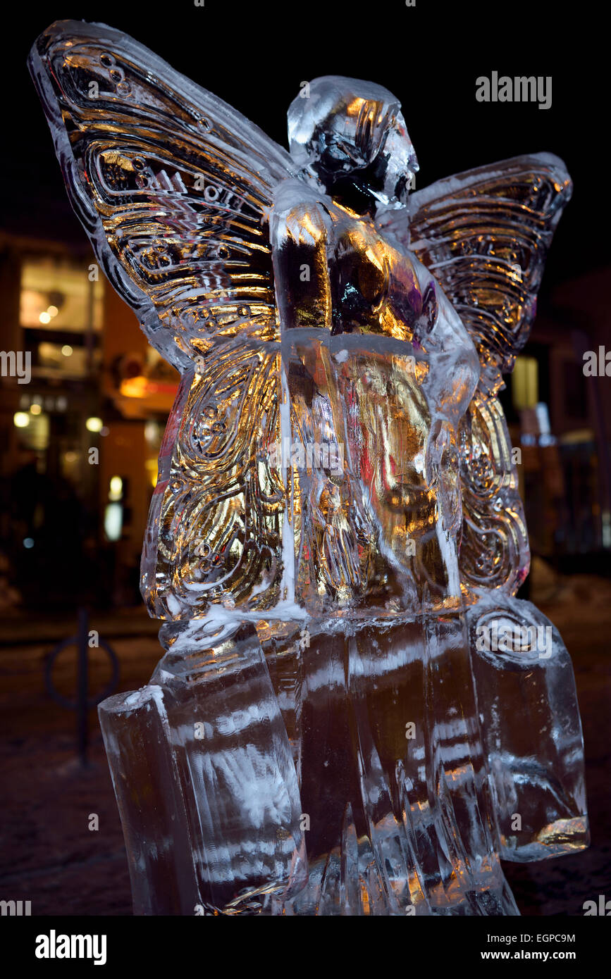Clear winged female angel ice sculpture at Bloor Yorkville Village Park Annual Icefest Toronto Stock Photo