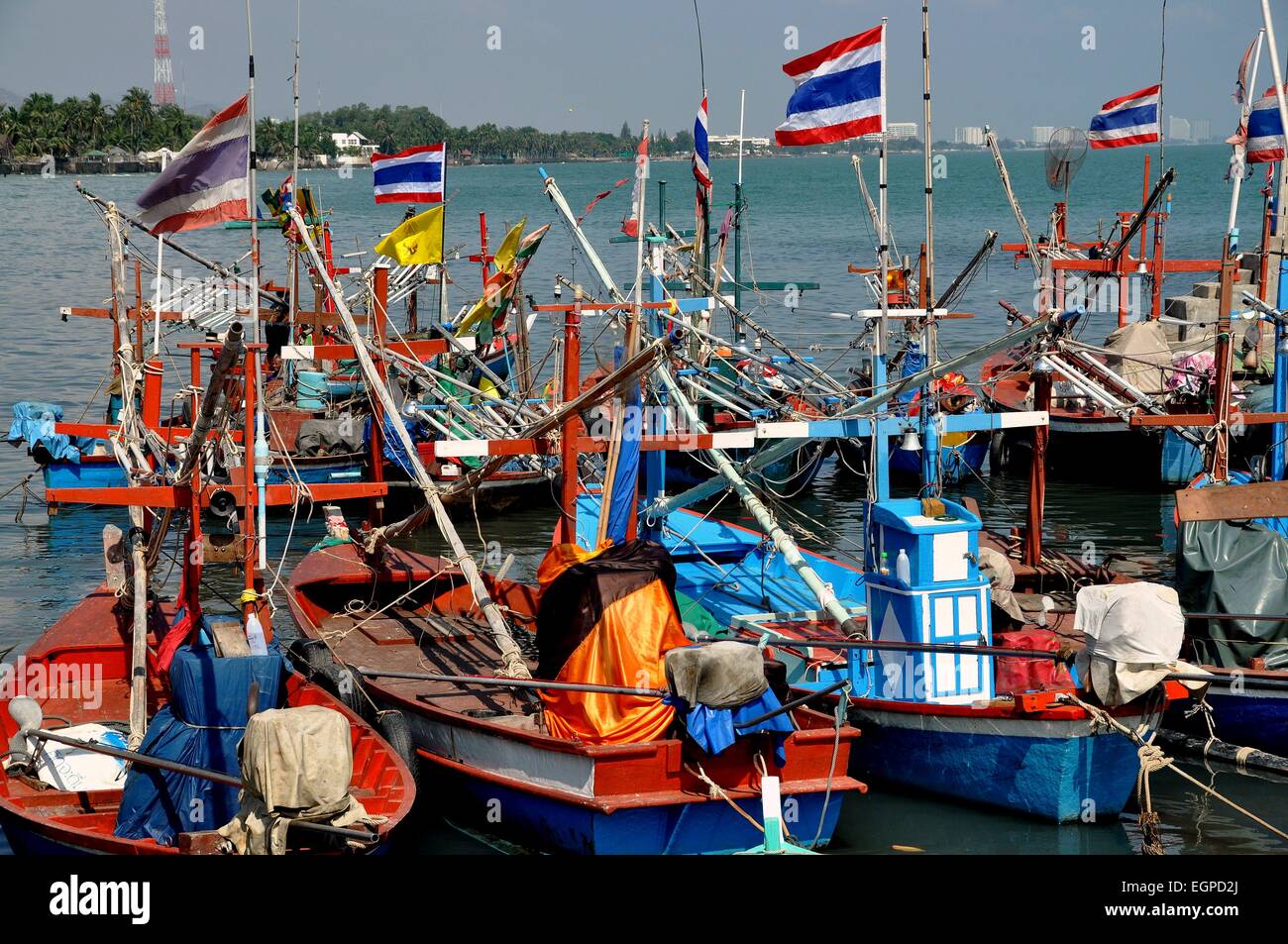 Hua Hin, Thailand A fleet of wooden fishing boats flying the Thai flag
