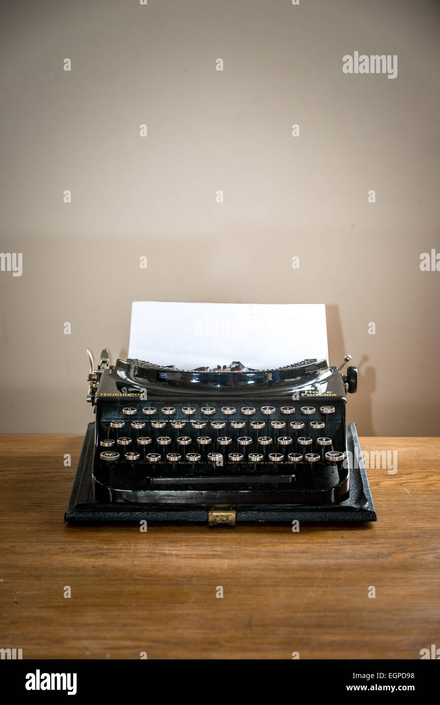 Vintage Portable Typewriter with Paper Stock Photo - Image of