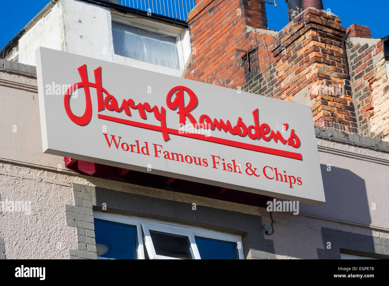 Sign for a franchise of 'Harry Ramsdens' famous fish and chip shop Scarborough, UK Stock Photo