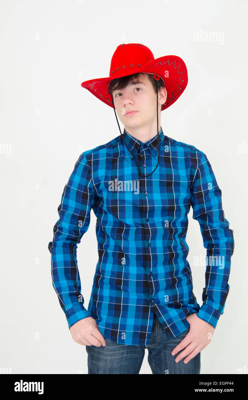 Teenager wearing cowboy cap isolated on white Stock Photo