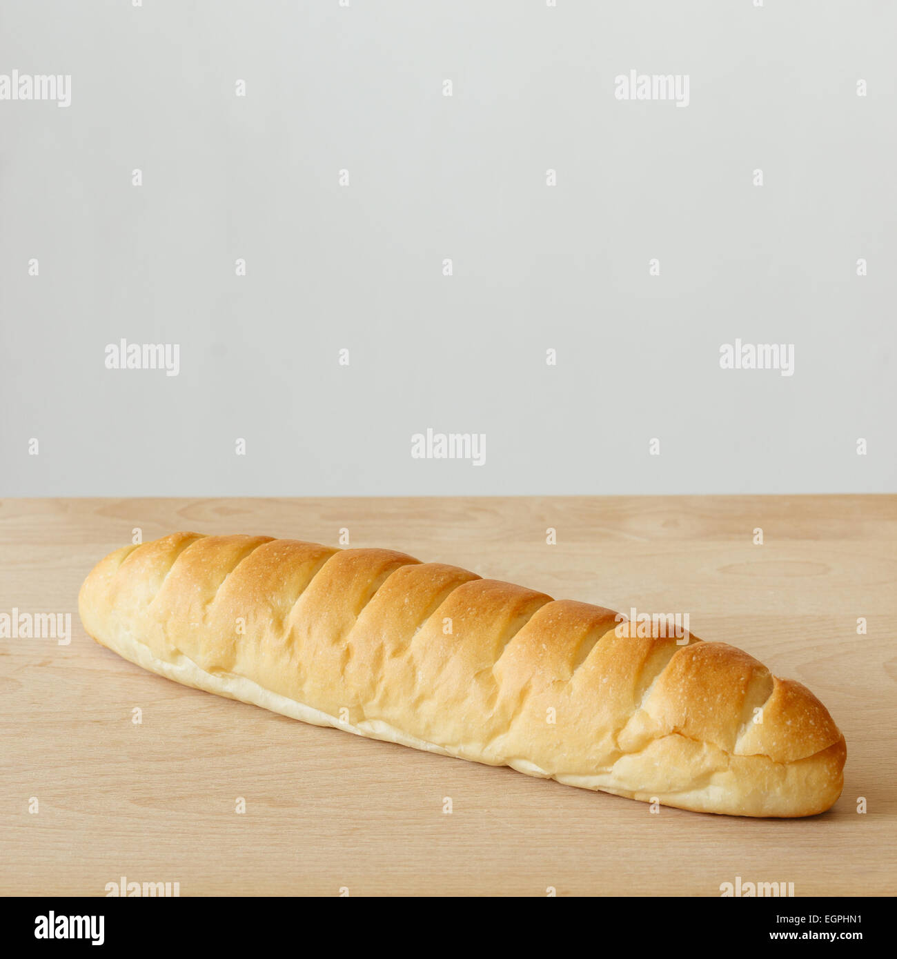 fresh bread on wooden white background Stock Photo - Alamy