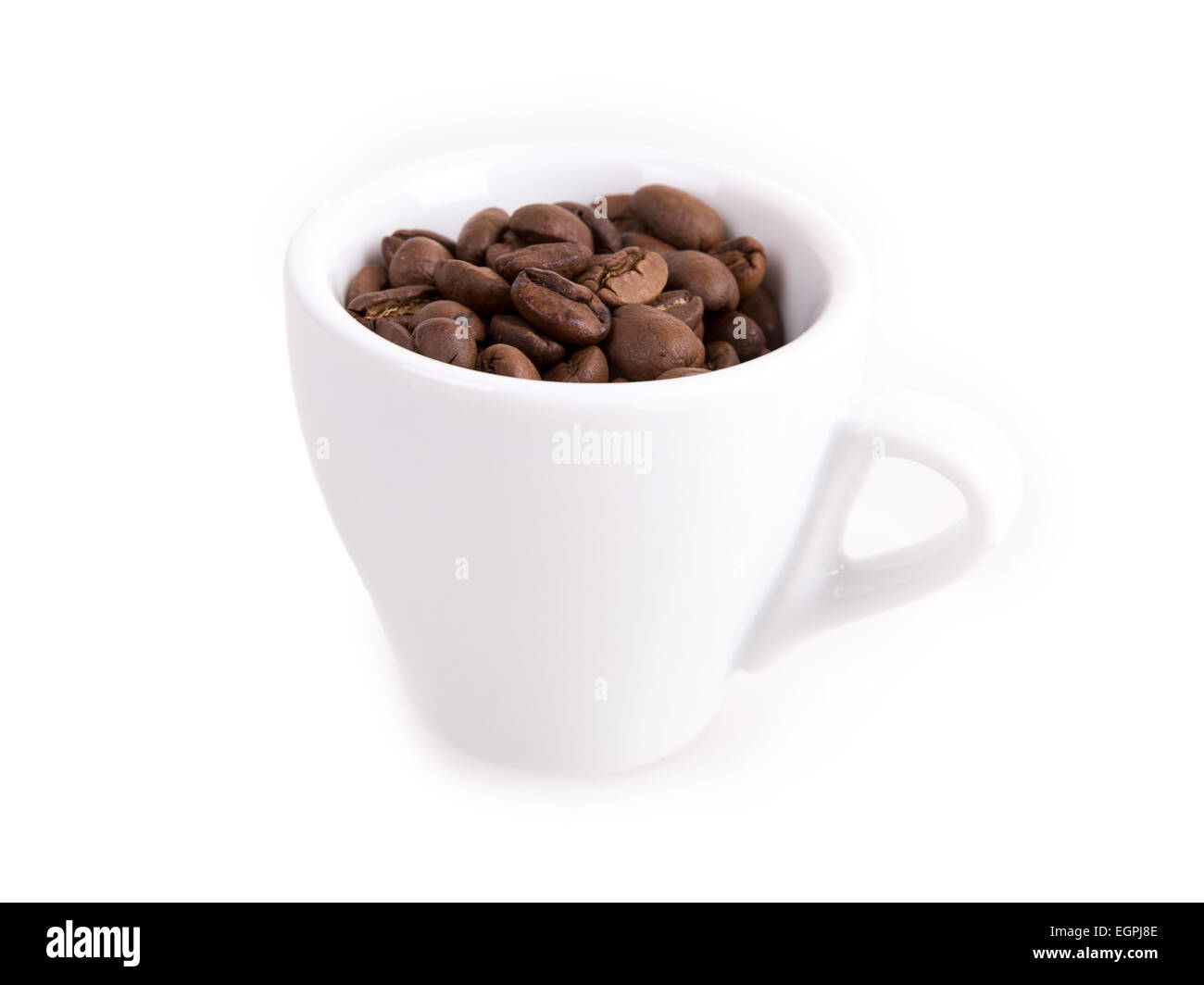 coffee cup and coffee beans on a white background Stock Photo - Alamy