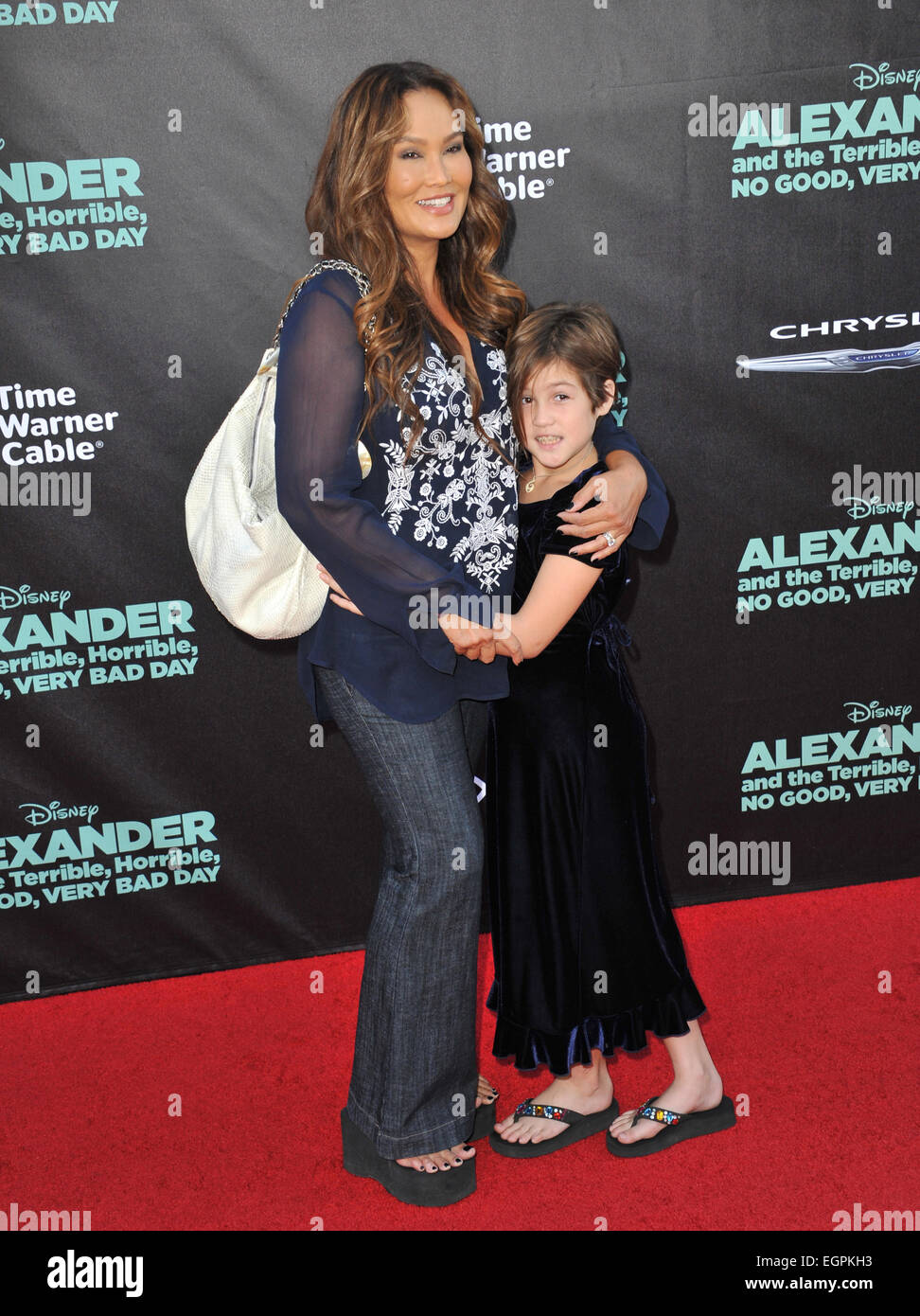 LOS ANGELES, CA - OCTOBER 6, 2014: Tia Carrere & daughter Bianca Wakelin at the world premiere of 'Alexander and the Terrible, Horrible, No Good, Very Bad Day' at the El Capitan Theatre, Hollywood. Stock Photo