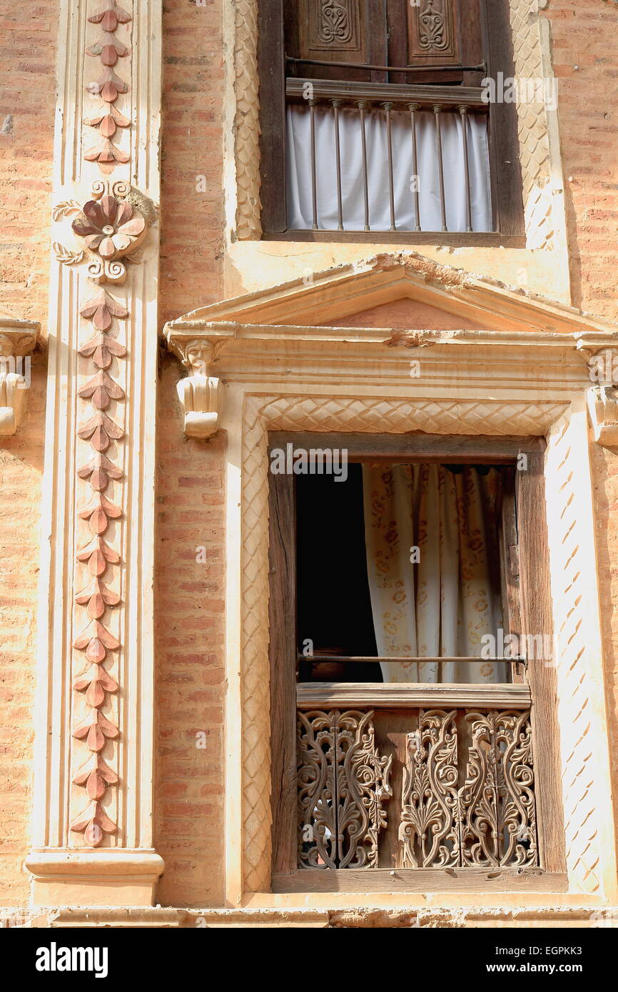 Sample of facade with classical window of a traditional newar style house in the old city area. Panauti-Kavrepalanchok district. Stock Photo