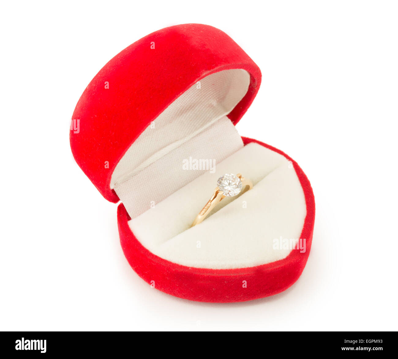 gold wedding ring in a red gift box Stock Photo - Alamy
