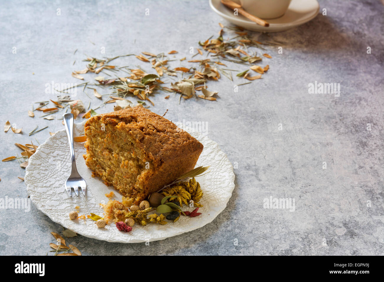 carrot cake, autumn leaves at snack time Stock Photo