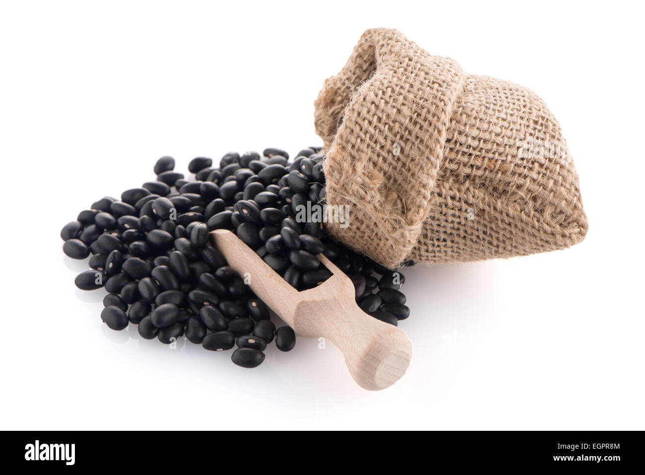 Black beans bag with wooden scoop on white background Stock Photo Alamy