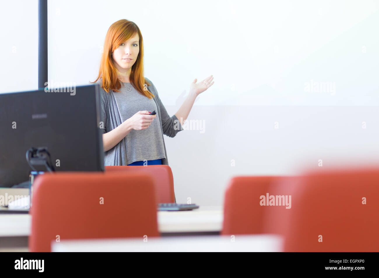 Businesswoman giving a talk. Stock Photo