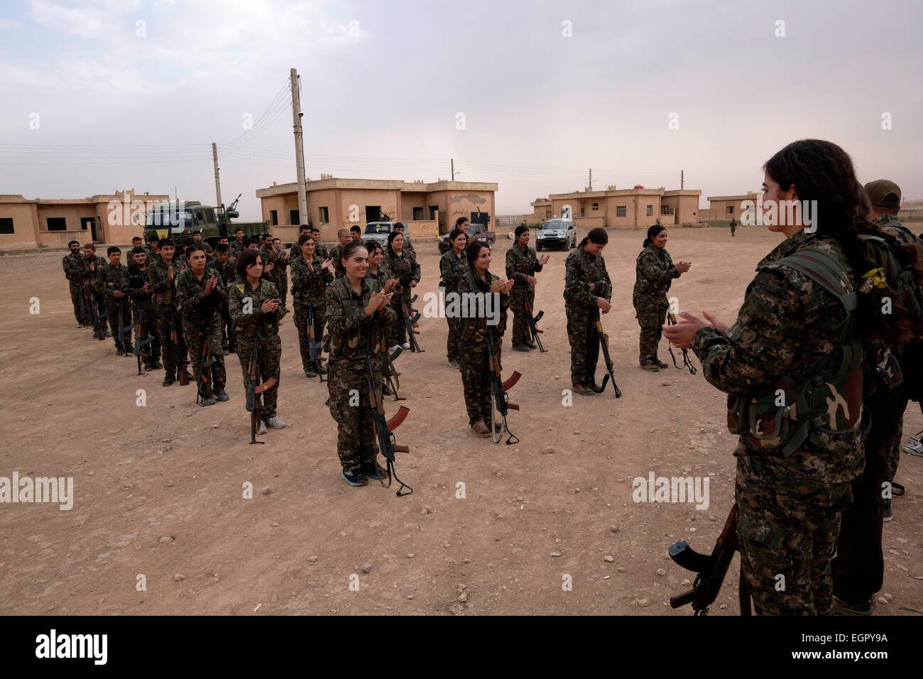 Kurdish People's Protection Unit YPG ( Male) and YPJ ( Female) fighters ...