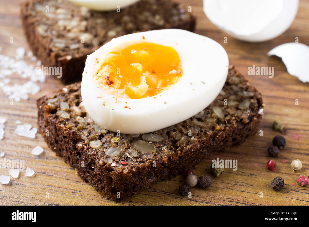 Hard boiled egg sandwich on a table Stock Photo Alamy