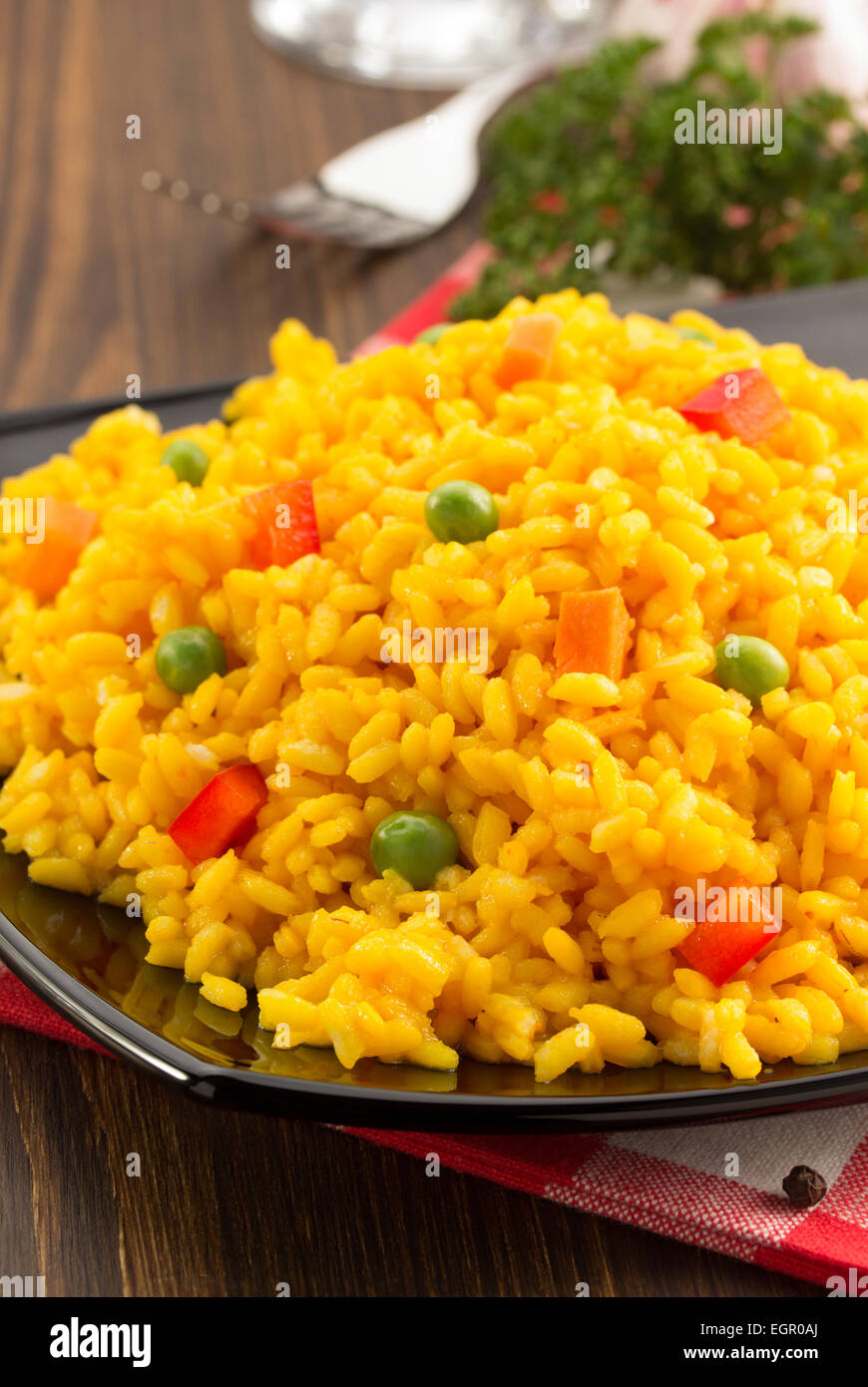 bowl full of rice on wooden background Stock Photo - Alamy