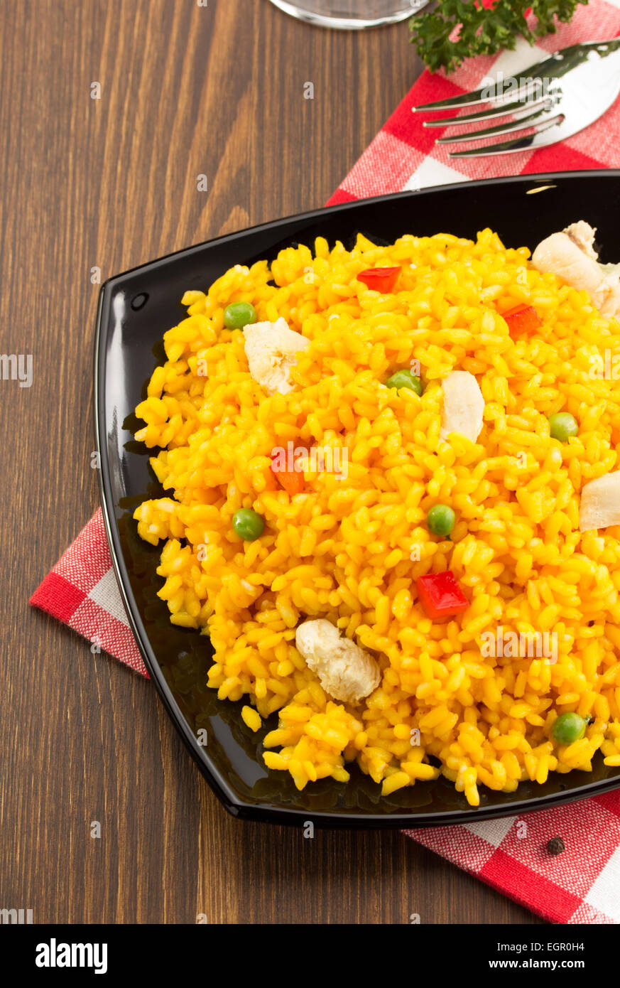 bowl full of rice on wooden background Stock Photo - Alamy