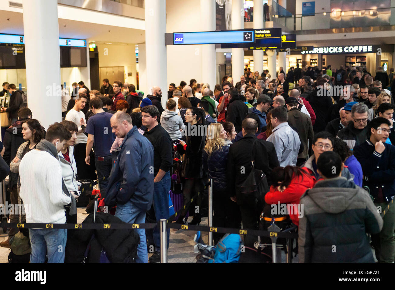 Copenhagen, Denmark, March 1, 2015: Stranded passengers in Copenhagen Airport. They were booked on SAS flights but cabin crews wildcat strike grounded Saturday some 80 flights and today Sunday morning, some 50 flights to and from Copenhagen is cancelled Credit:  OJPHOTOS/Alamy Live News Stock Photo