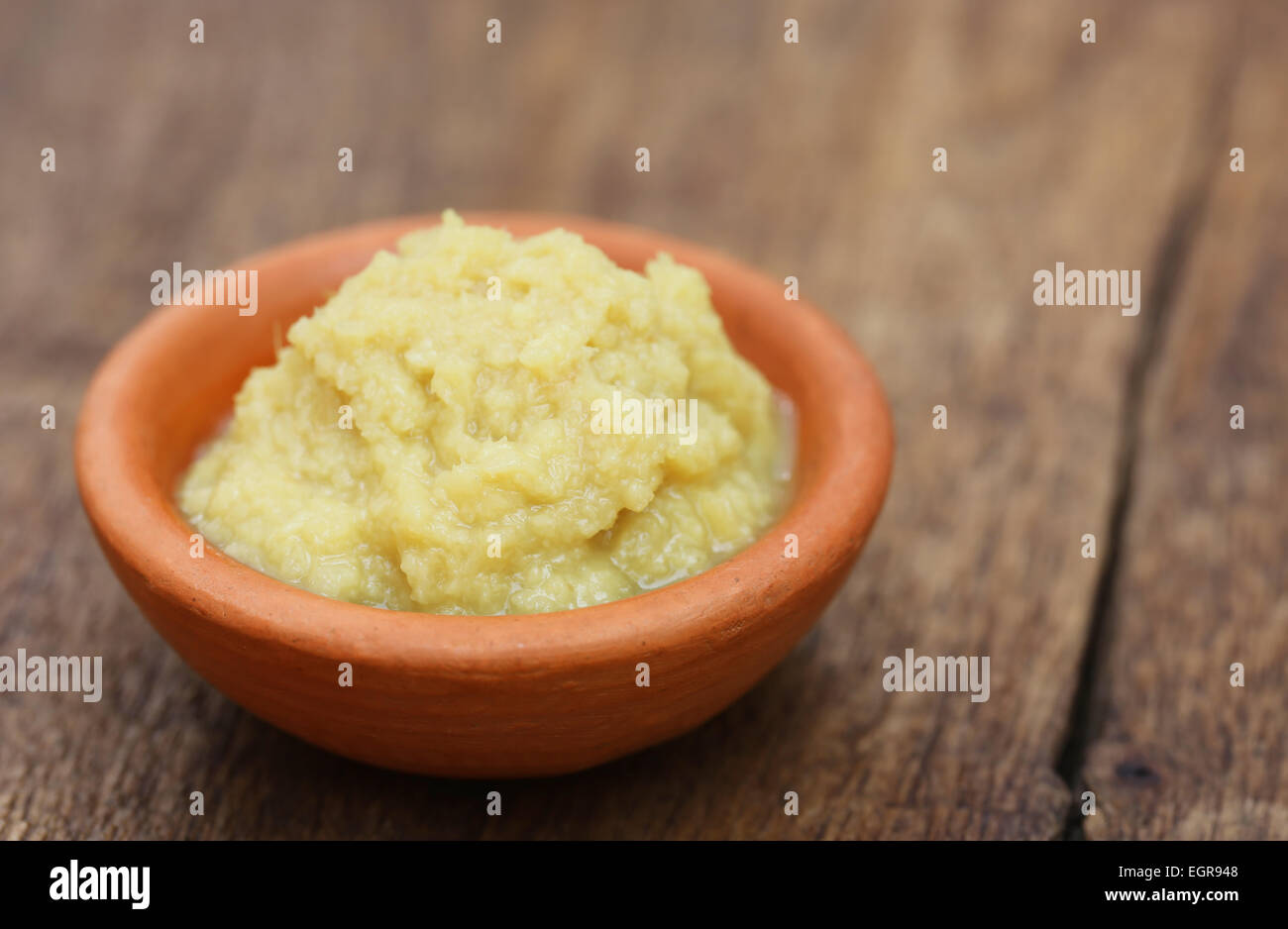 Fresh crushed ginger in a bowl Stock Photo Alamy