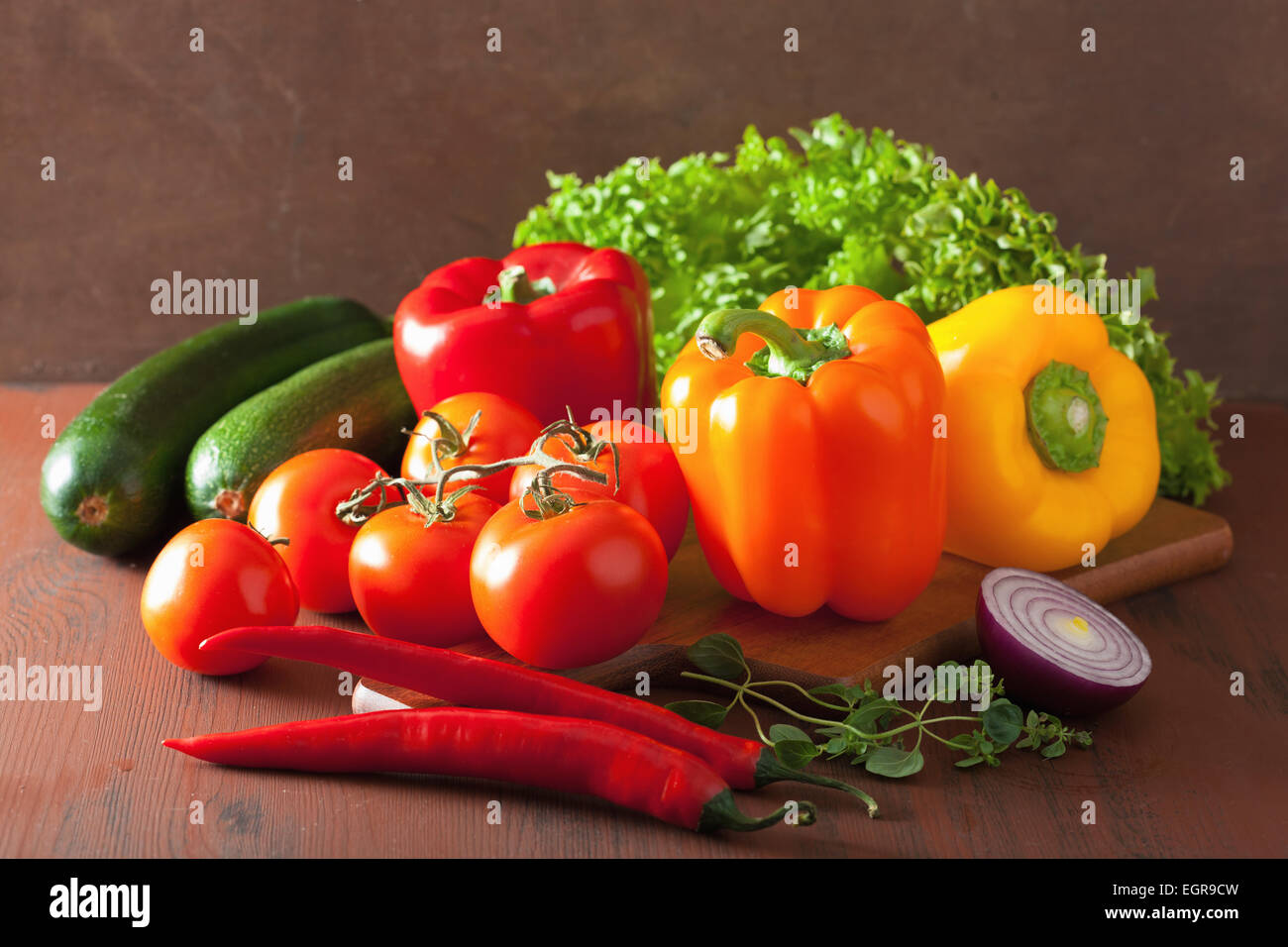 healthy vegetables pepper tomato salad onion chilli on rustic ...