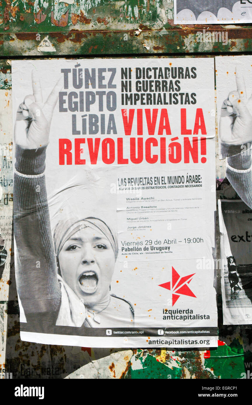Historical arab spring poster on wall 2010, Spain Stock Photo