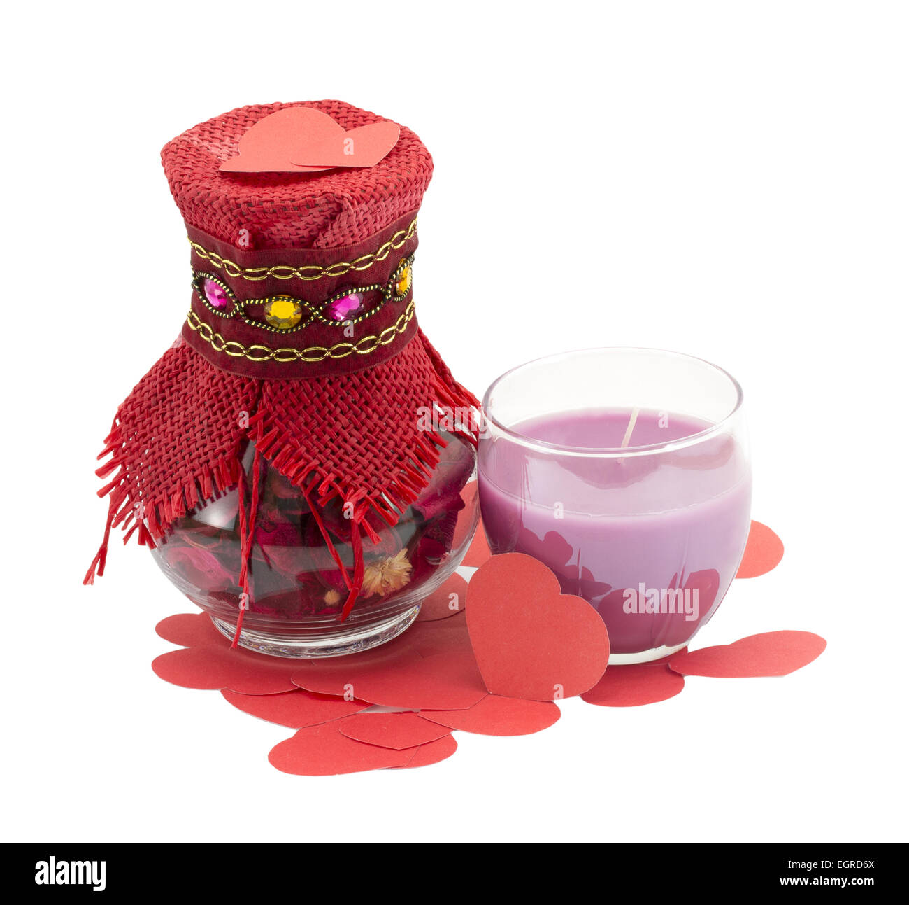 rose petals in a glass jar on a white background Stock Photo Alamy