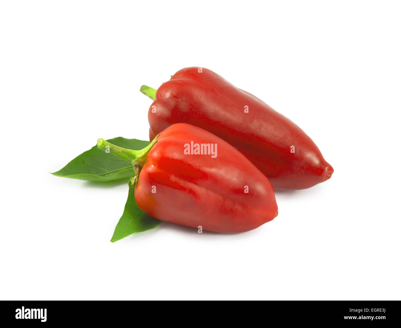 sweet red peppers on a white background Stock Photo - Alamy