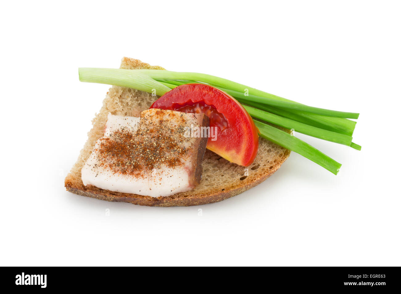 black bread, smoked bacon fat, green onions Stock Photo Alamy