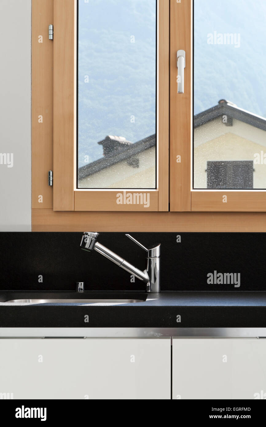 sink of modern kitchen with window Stock Photo - Alamy