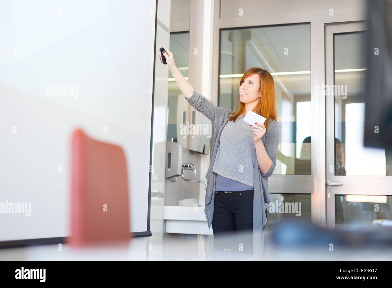 Businesswoman giving a talk. Stock Photo