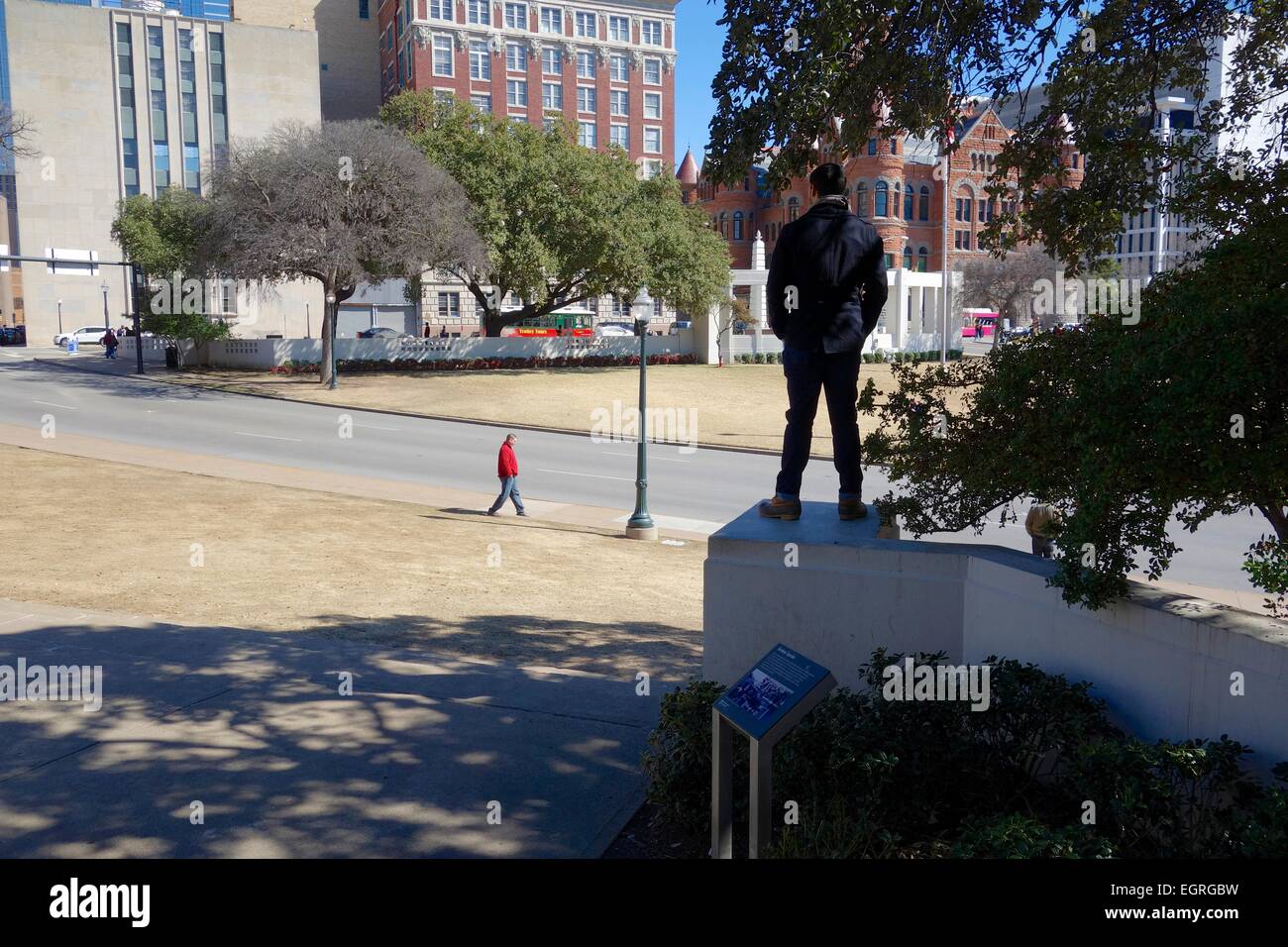 Man standing on pedestal from which Abraham Zapruder filmed JFK
