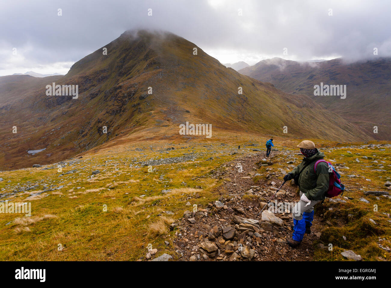 Hillwalkers on the ridge between Ben More and Stob Binnein, Scottish Highlands Stock Photo