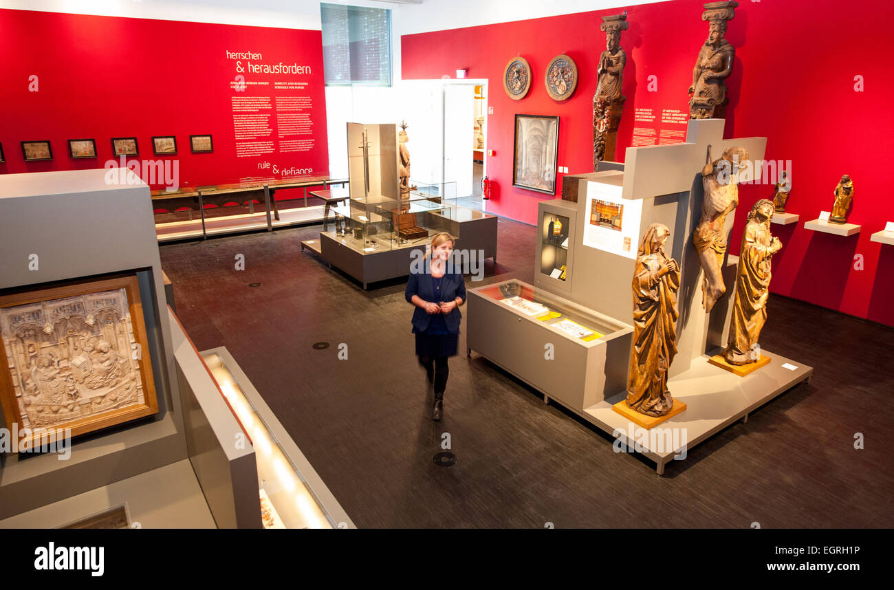 The museum's director, Heike Dueselder walks through a room with exhibition pieces from the 13th to 17th centuries in Lueneburg, Germany, 26 February 2015. The new Lueneburg Museum is to open on 01 March 2015. Photo: Philipp Schulze/dpa Stock Photo